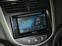 Фотография установки магнитолы Pioneer AVH-160DVD в Hyundai Solaris