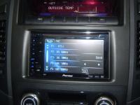 Фотография установки магнитолы Pioneer AVH-P3100DVD в Mitsubishi Pajero IV