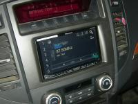 Фотография установки магнитолы Pioneer AVH-X8600BT в Mitsubishi Pajero IV