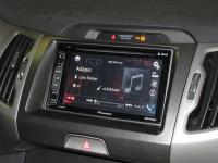 Фотография установки магнитолы Pioneer AVH-X2700BT в KIA Sportage III (SL)