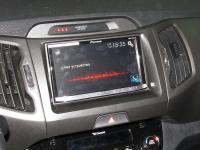 Фотография установки магнитолы Pioneer AVH-X8700BT в KIA Sportage III (SL)