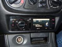 Фотография установки магнитолы Kenwood KIV-700 в Nissan Almera