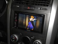 Фотография установки магнитолы Pioneer AVH-180 в Suzuki Grand Vitara