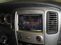 Фотография установки магнитолы Kenwood DNX4150BTR в Ford Escape