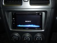 Фотография установки магнитолы Sony XAV-E622 в Subaru Impreza