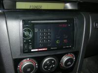 Фотография установки магнитолы Pioneer AVH-2400BT в Mazda 3