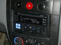 Фотография установки магнитолы Alpine CDE-W233R в Chevrolet Aveo T200