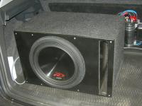 Установка сабвуфера Alpine SWR-12D4 vented box в Nissan X-Trail (T31)