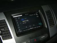Фотография установки магнитолы Pioneer AVH-X8600BT в Mitsubishi Outlander XL