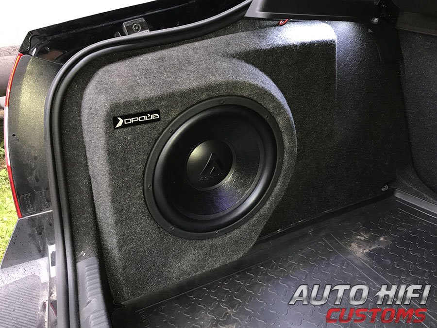 Установка сабвуфера Aspect GLW-12s4 SQ в Skoda Rapid